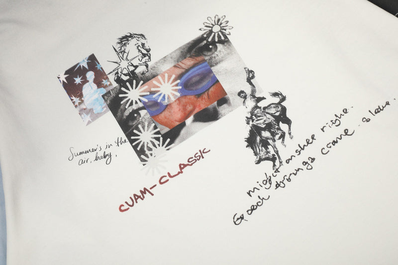 Close-up of vintage collage graphic on cream tee with handwritten text and horse artwork
