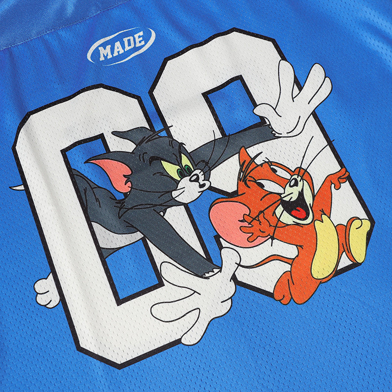 Blue Tom and Jerry football jersey graphic with oversized varsity letters and cartoon characters in action