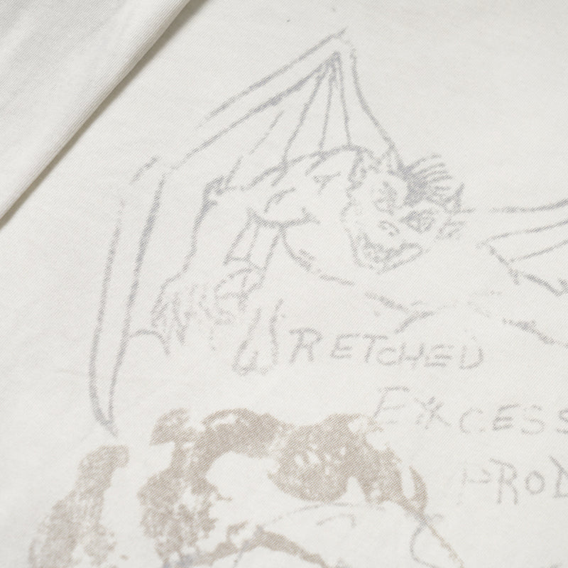 Close-up of the printed bat sketch on cream long sleeve tee