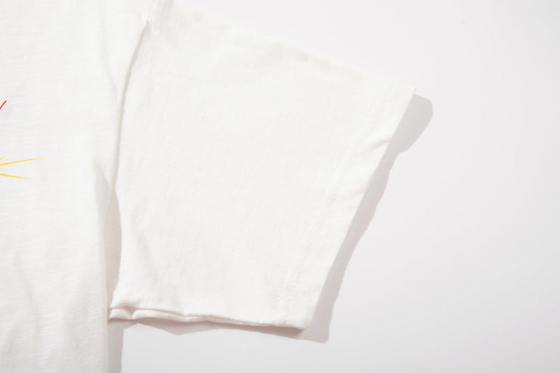 Off-white Number (N)ine graphic T-shirt with horse print and cropped sleeve detail on a clean white background