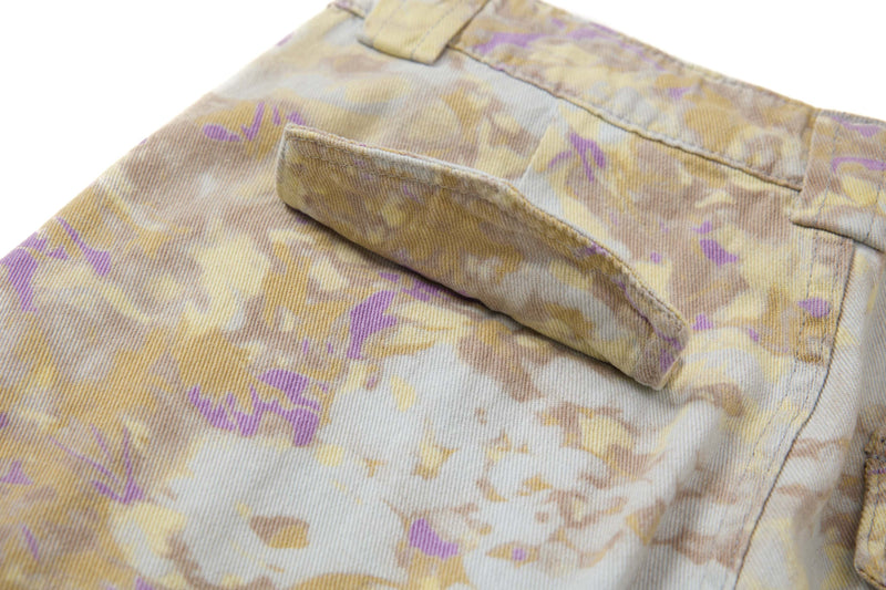 Close-up of the back cargo pocket flap on abstract camo cotton pants