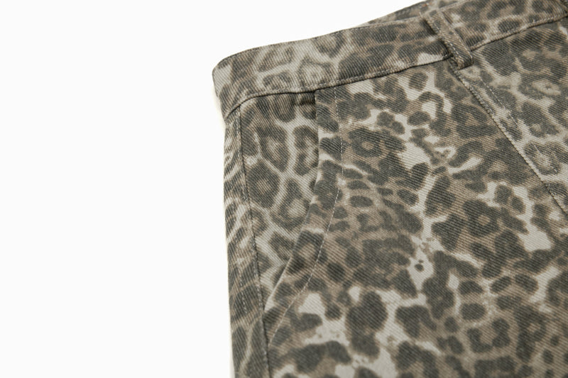 Close-up of side waistband and seam on leopard print wide leg pants