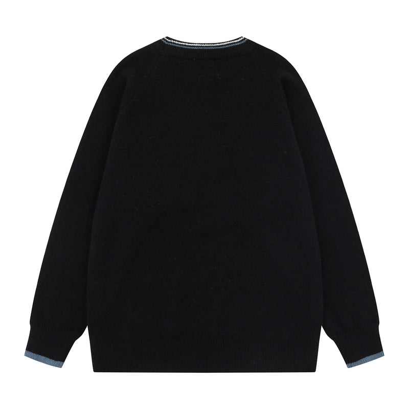 Black knit sweater back view with solid plain back and ribbed cuffs