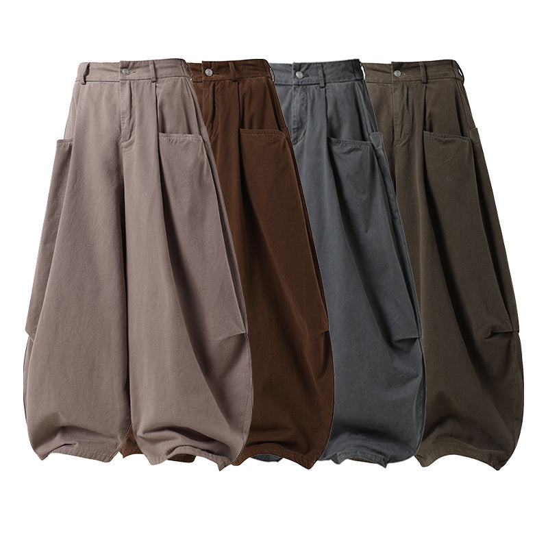 Taupe wide-leg barrel pants with oversized side pockets and cinched hems, shown flat on white background
