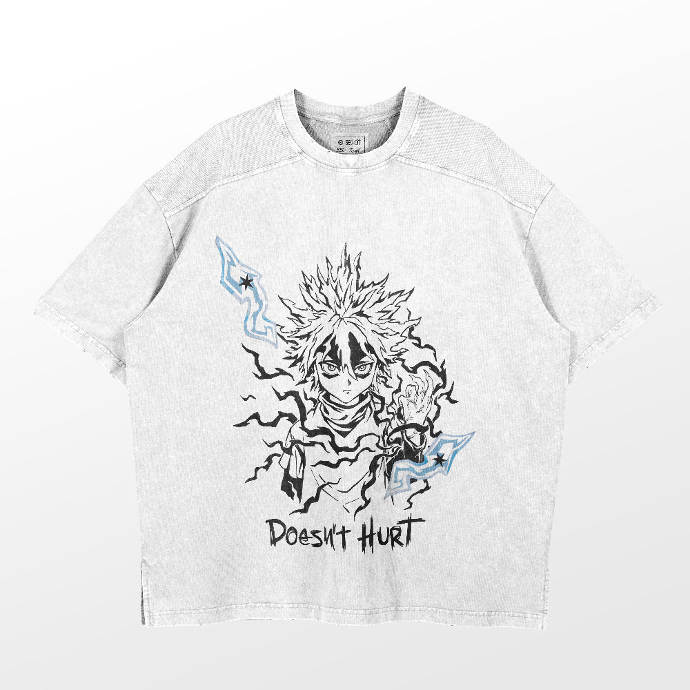 The Hunter × Hunter 'Doesn't Hurt' T-shirt features a vintage wash on 260 GSM high-quality cotton, showcasing an illustrated character with spiky hair amidst swirling lines and blue stars. The design is accented with the text "Doesn't Hurt" for extra flair.