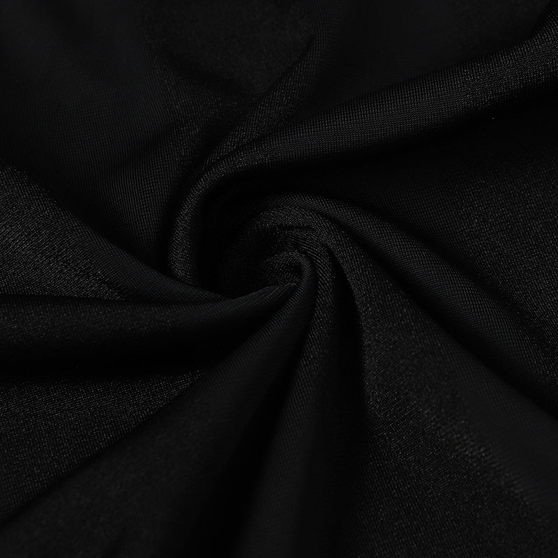 Black textured jersey fabric with a subtle spiral drape, suitable for a sports club football T-shirt