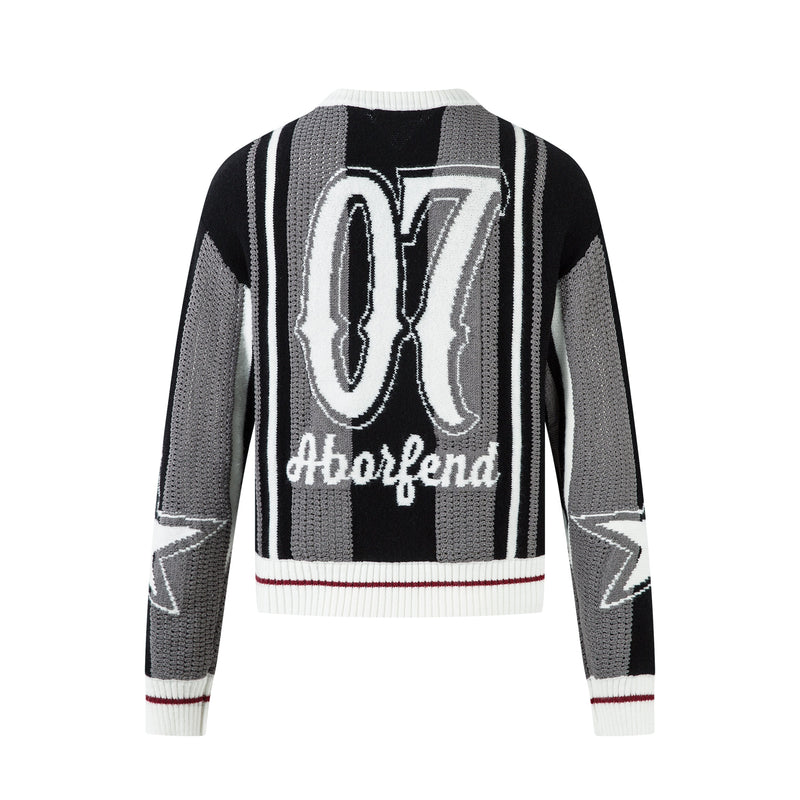 Back view of black and gray knit sweater with large number 07 graphic and striped trim