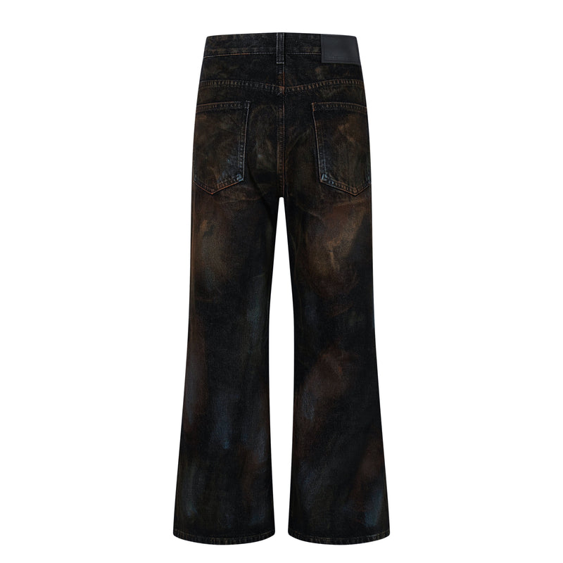 Back view of dark wide-leg jeans with faded wash and patch back pockets
