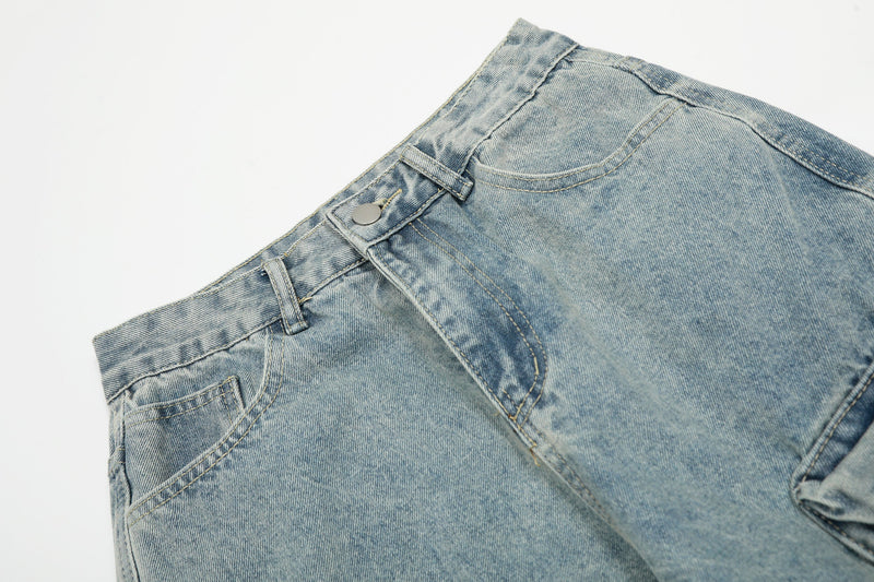 Light wash denim waistband and front button detail with belt loops