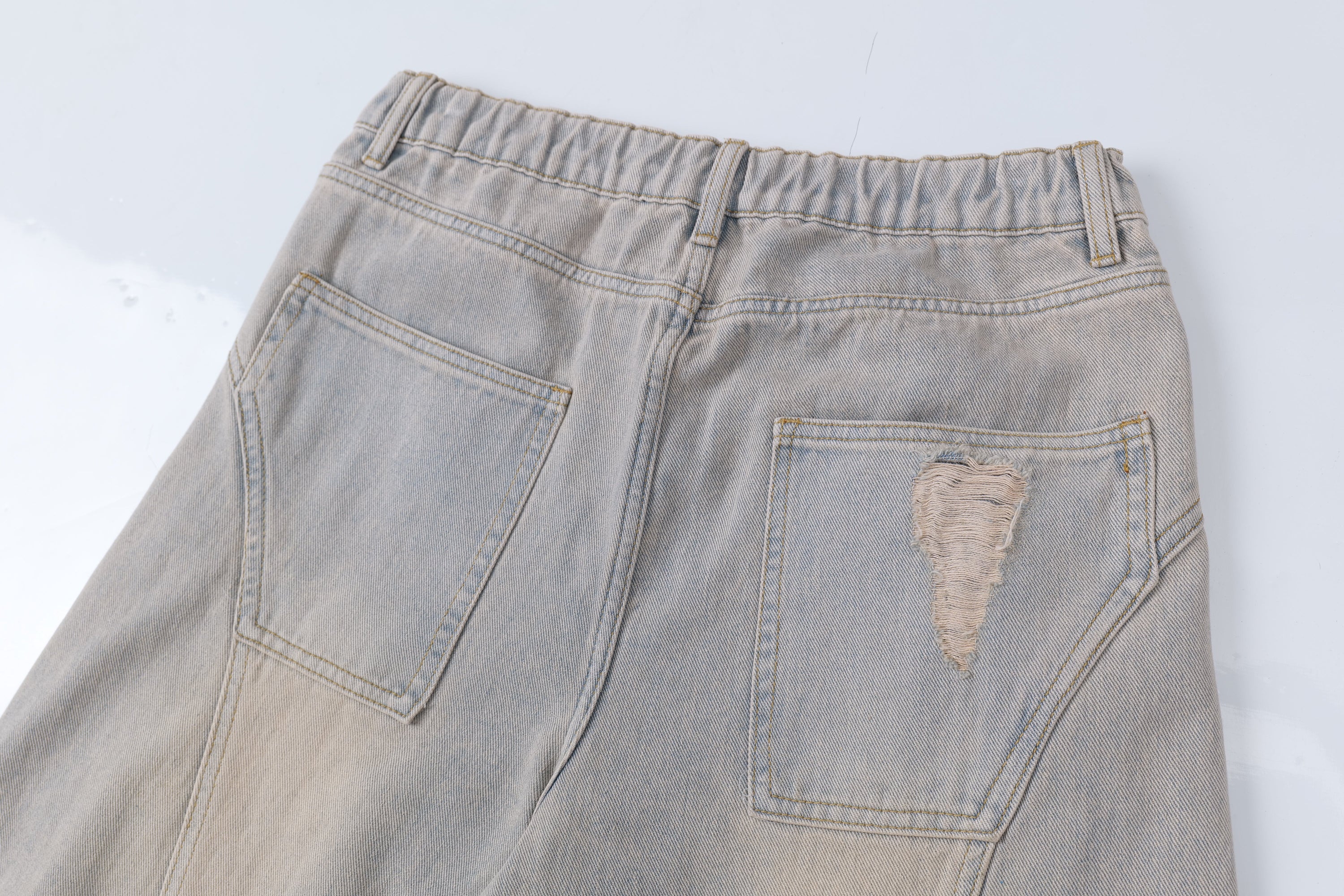 Distressed Curved Wide-Leg Jeans | Vintage Wash Streetwear