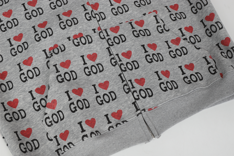 Gray hoodie hem and front zipper detail with all-over I Love God print