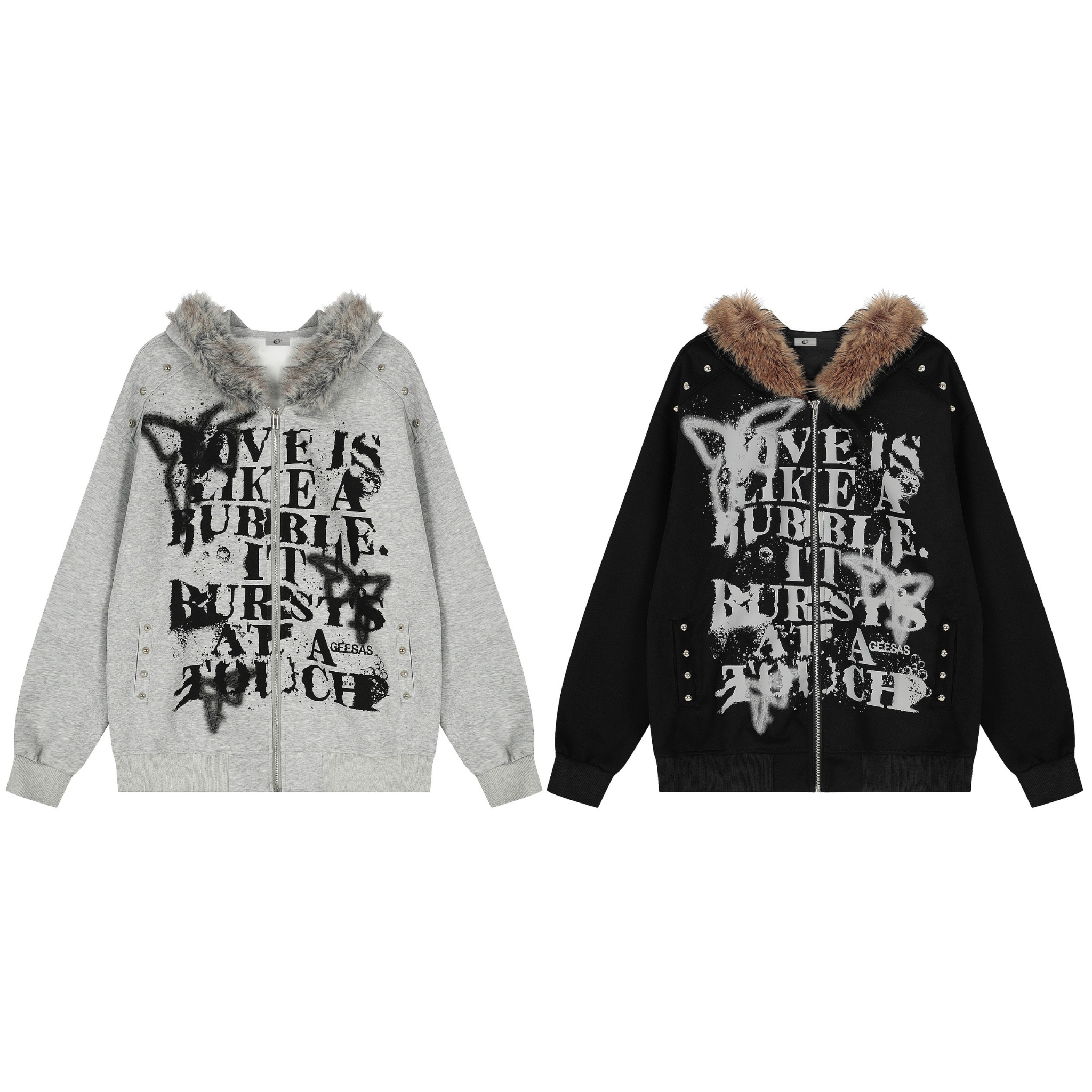 Grey zip-up hoodie with faux-fur collar, distressed graffiti print, and metal stud detailing on a white background