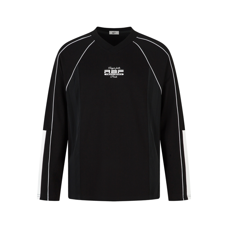 Black long-sleeve raglan top with white piping, front view
