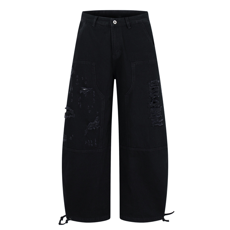Black distressed wide-leg denim pants front view with ripped details and drawcord hems