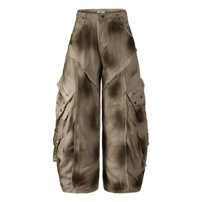 Front view of distressed khaki cargo barrel pants with flap pockets and dark spray-dyed shading