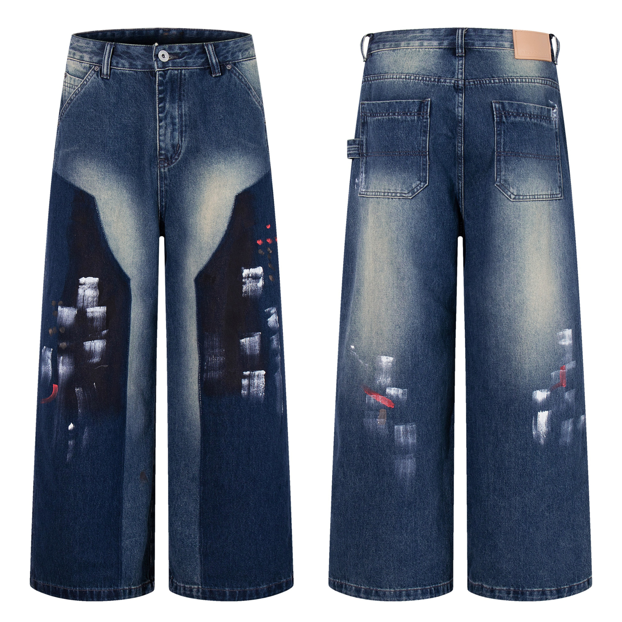 Front view of wide-leg blue denim jeans with abstract white and red brushstroke paint effects and vintage fade wash