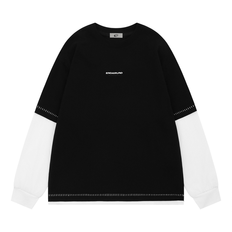 Black long-sleeve crewneck tee with white sleeves and contrast stitch details
