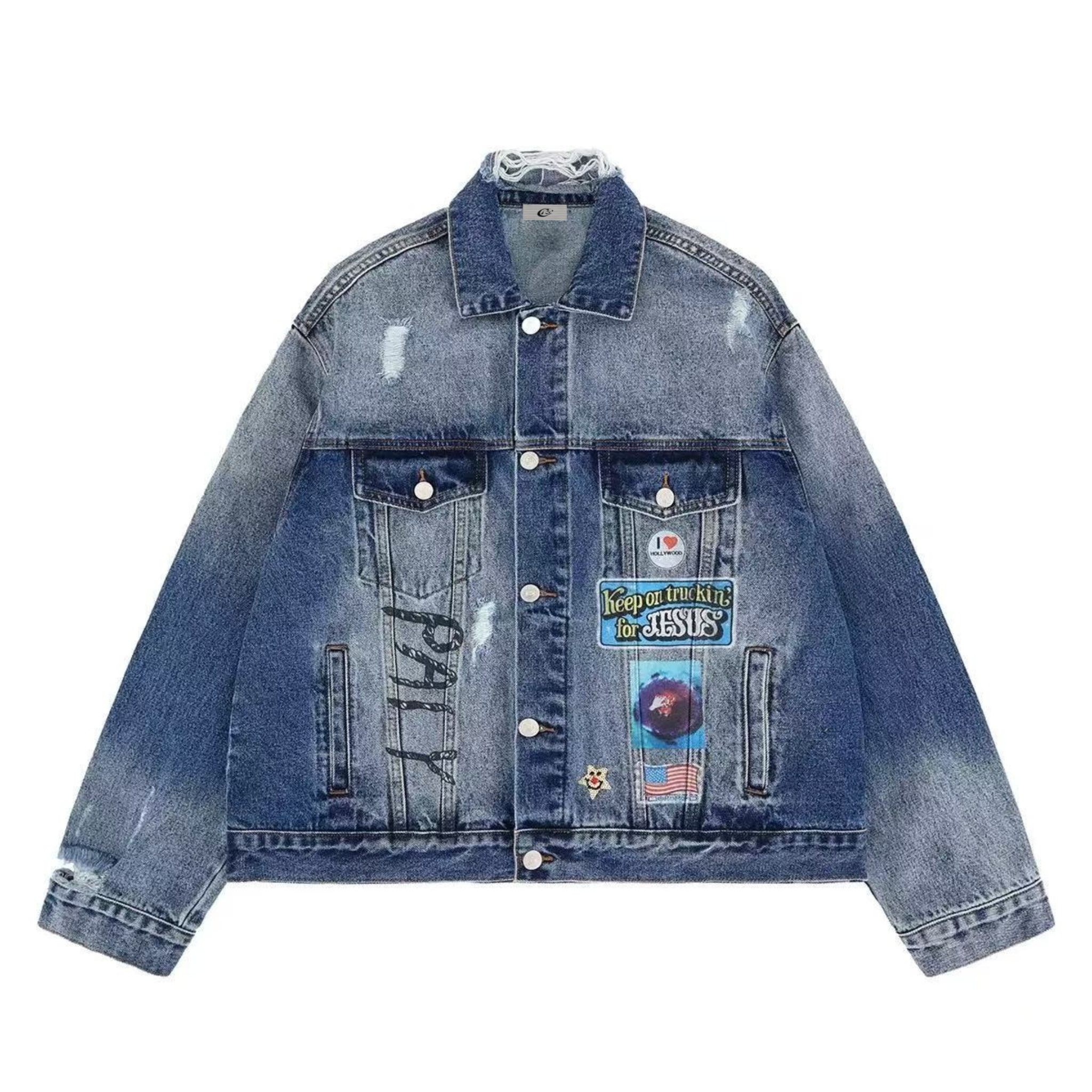 Front view of a distressed blue denim jacket with retro patches including Keep on Truckin for Jesus and US flag graphics