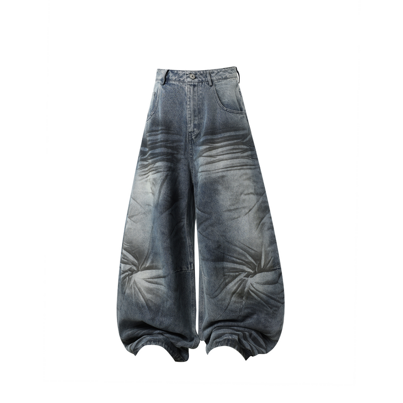 Front view of oversized barrel jeans in faded blue wave-wash denim