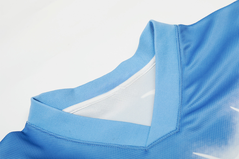 Close-up of a light blue mesh football jersey collar with breathable fabric and stitched V-neck detail