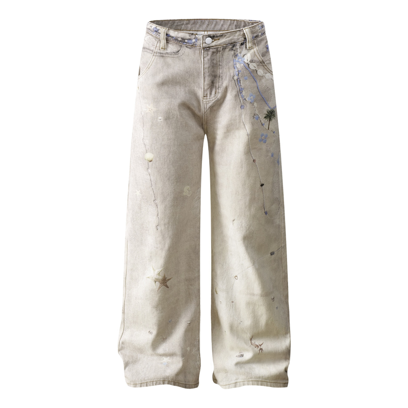 Front view of wide-leg jeans with washed botanical print and floral palm tree details