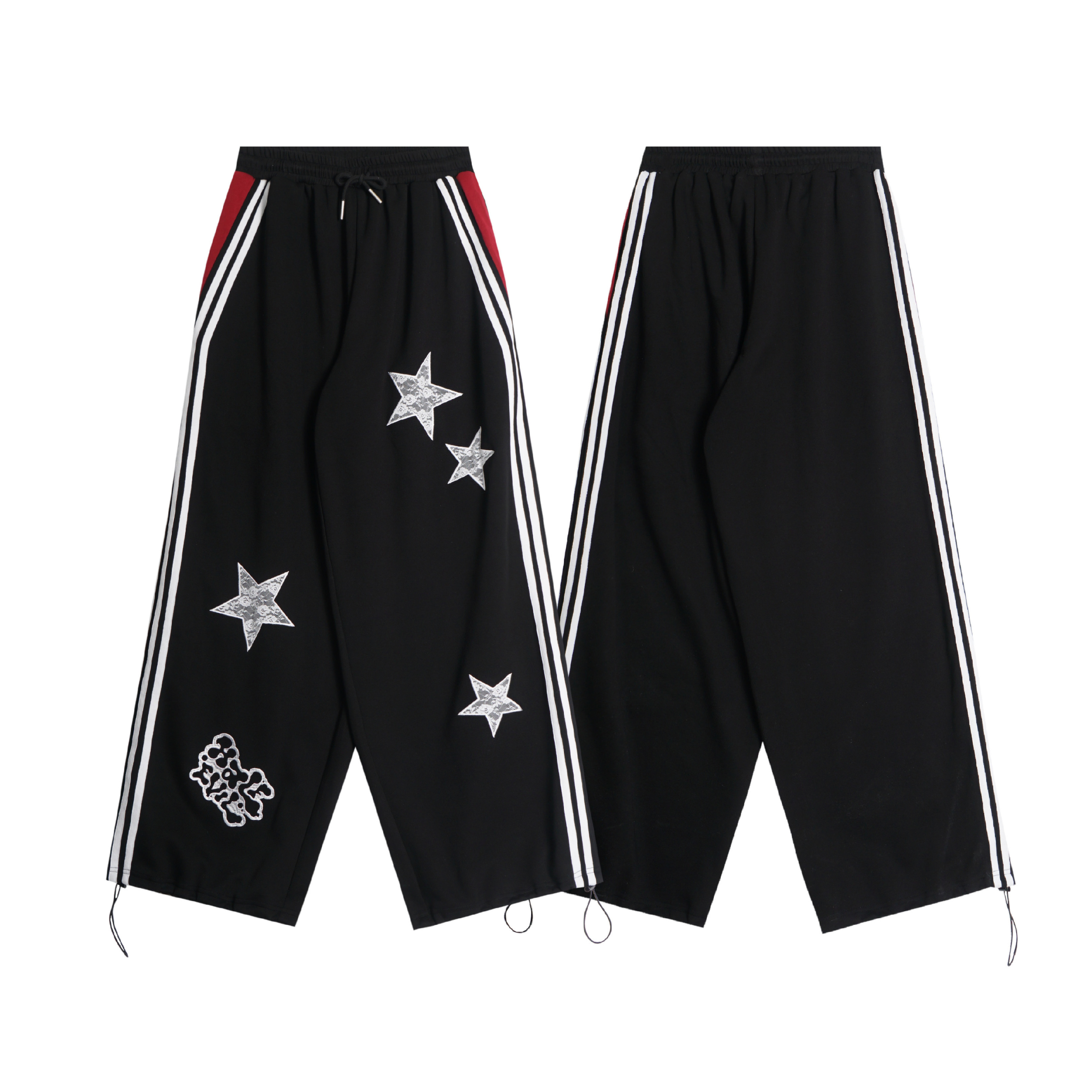 Black wide-leg track pants with lace star appliqués, triple white side stripes, red hip accent, and drawstring waist, shown f