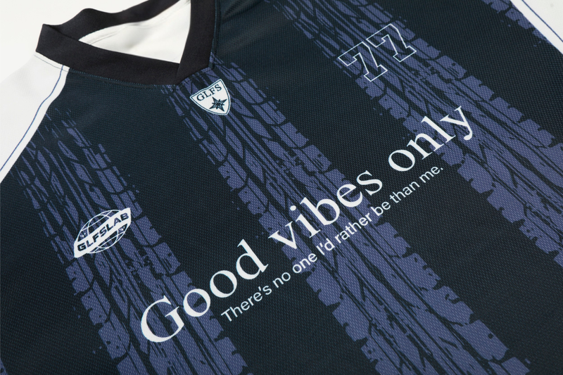 Seakoff 77 Good Vibes mesh soccer jersey in black with purple streaks and bold graphic text detailing