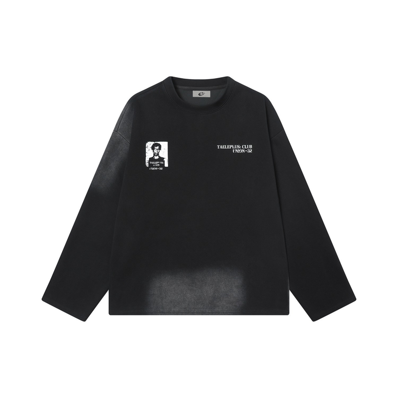 Black long sleeve tee with front graphic print and small chest text