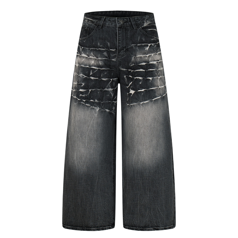 Front view of black cracked-wash wide-leg jeans with faded white distressing and straight legs