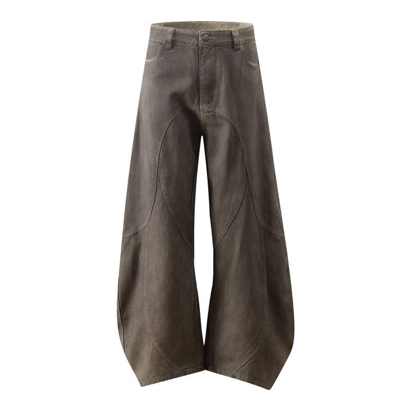 Front view of washed olive-brown wide-leg jeans with curved panel seams and button fly