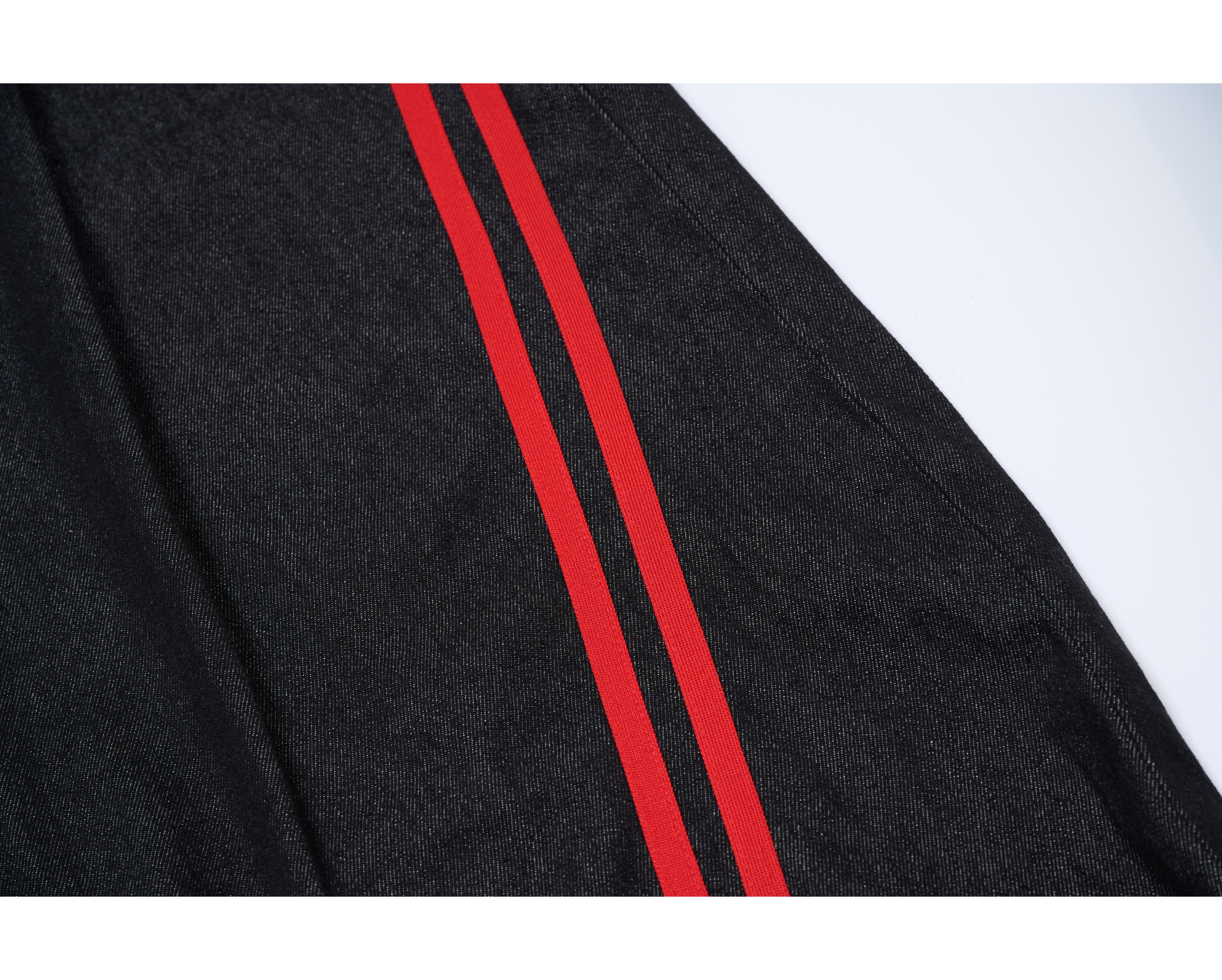 Wide-Leg Dark Denim Pants with Bold Red Side Stripes