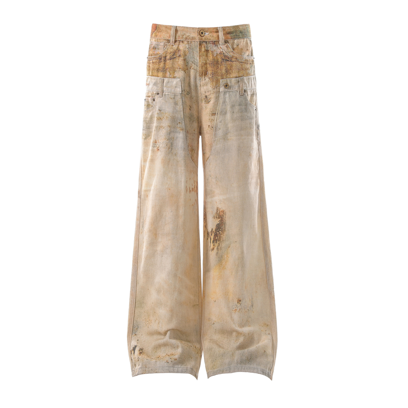 Front view of wide-leg vintage washed jeans in beige with paint-like distressing and cargo pockets