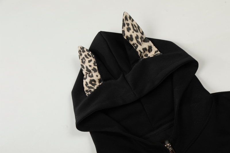 Close-up of black hood with leopard-print cat ears