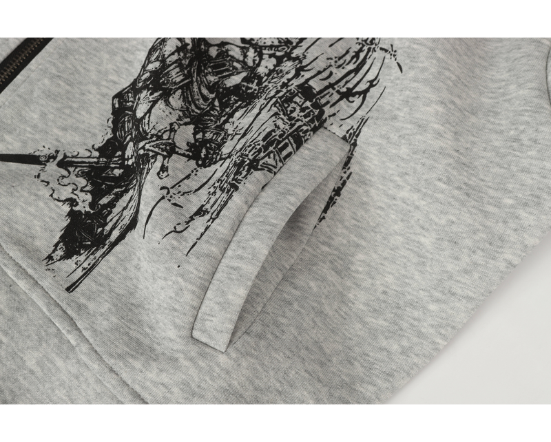 Close-up of light gray hoodie front pocket with black medieval graphic above the pocket