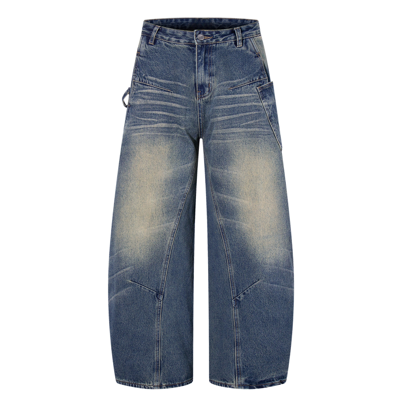 Front view of blue wide-leg jeans with whiskering, faded thighs, and large patch pockets