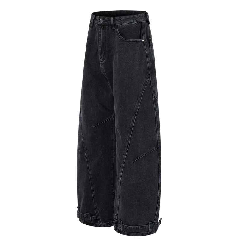 Angled front view of washed charcoal wide-leg denim pants with paneled seams and cuffed hems