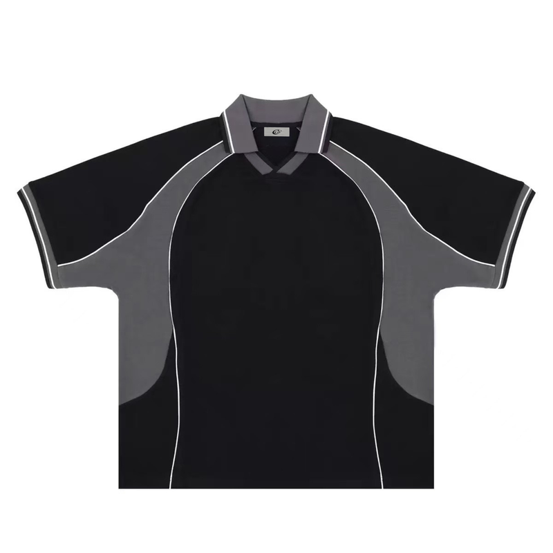 Black and gray oversized polo tee with contrast paneling, white piping, and a retro athletic collar