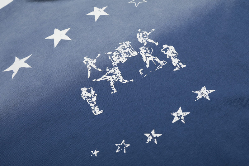 Blue washed cotton tee with faded white star graphic and distressed Seakoff lettering on the back