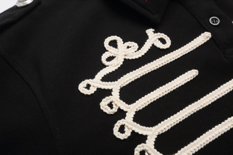 Black polo shirt with white military braid embroidery and decorative epaulettes detail