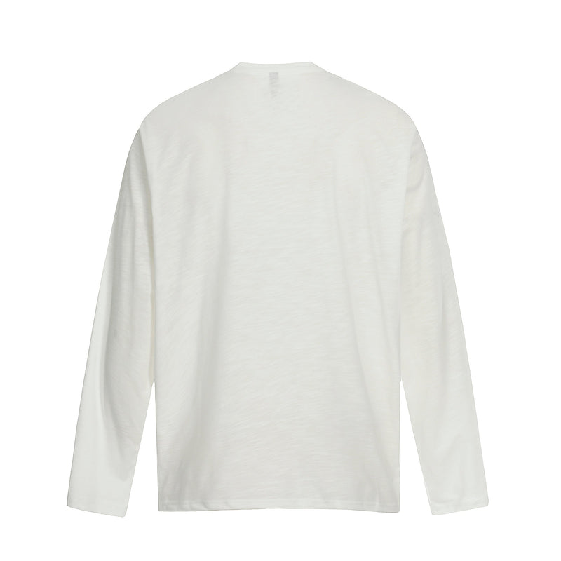 Back view of off-white long sleeve tee with plain washed finish