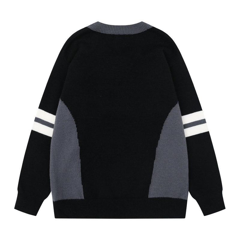 Back view of black knit sweater with gray collar, gray side panels, and white-striped sleeves