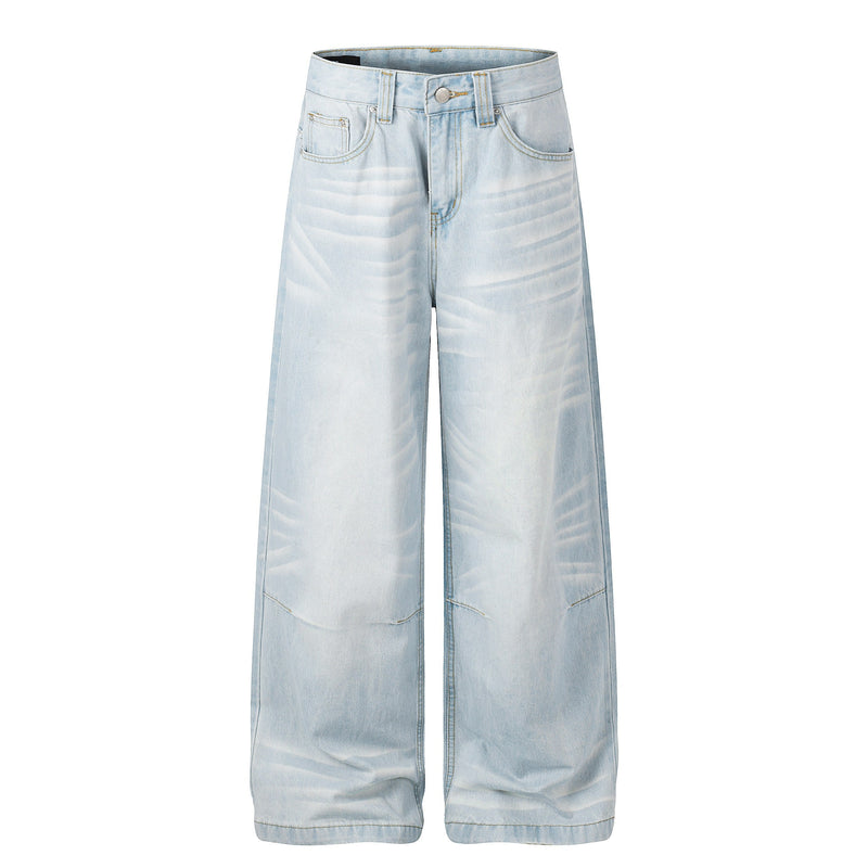 Light wash wide leg jeans front view with high waist and five-pocket styling