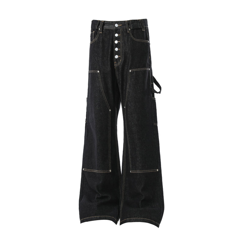 Front view of black wide-leg cargo jeans with button fly and side strap detail