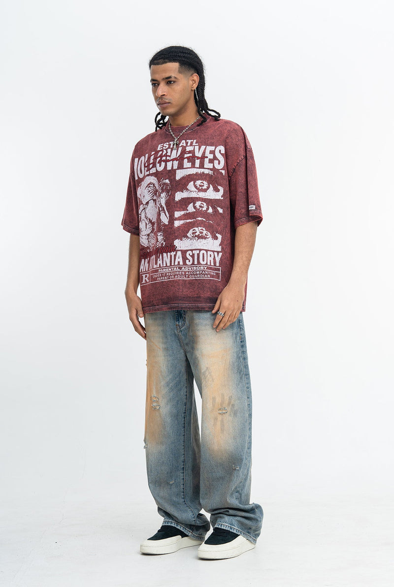 Oversized maroon vintage washed graphic tee with bold Atlanta story print and distressed denim styling on model