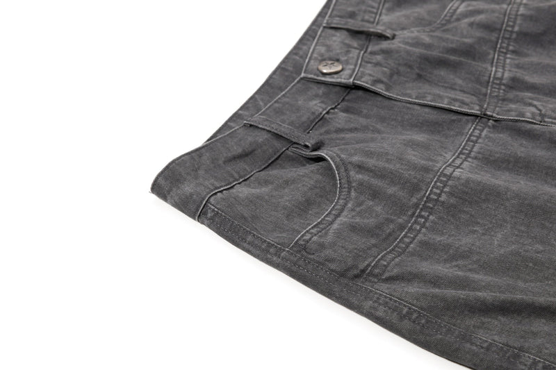 Dark gray cargo pant hem detail with stitched panel seams