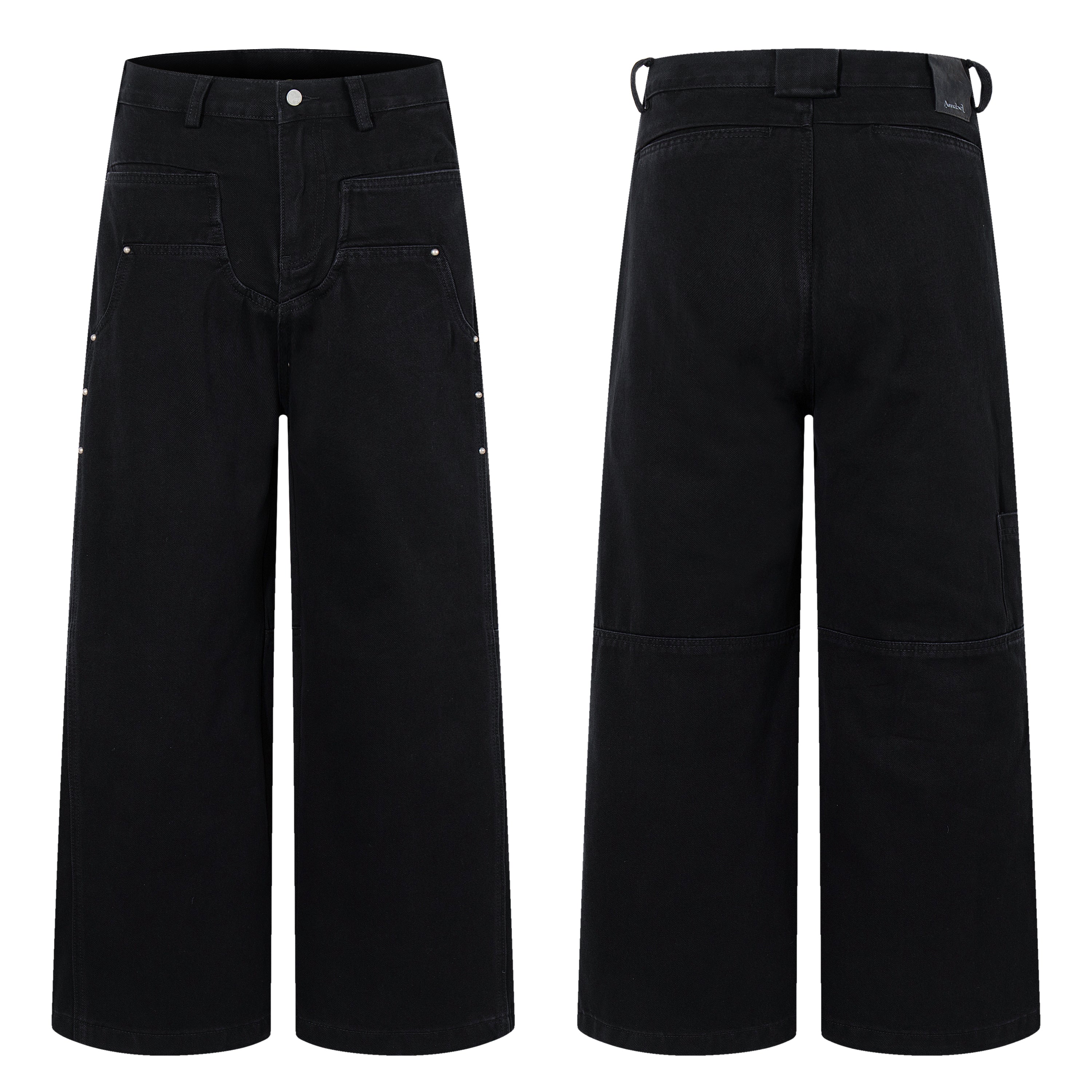 Front and back view of black wide-leg utility jeans with metal stud accents and patch pockets on white background