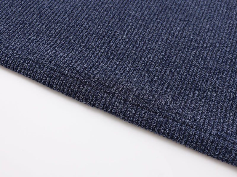Close-up of navy ribbed knit hem