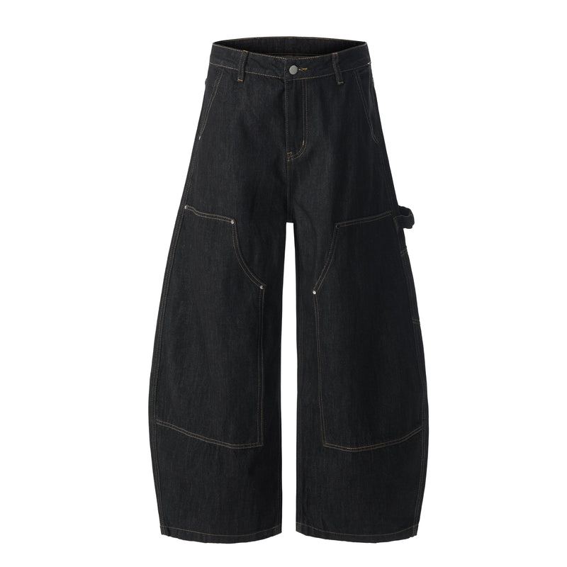Dark wash wide-leg carpenter jeans with front utility pockets and tan contrast stitching