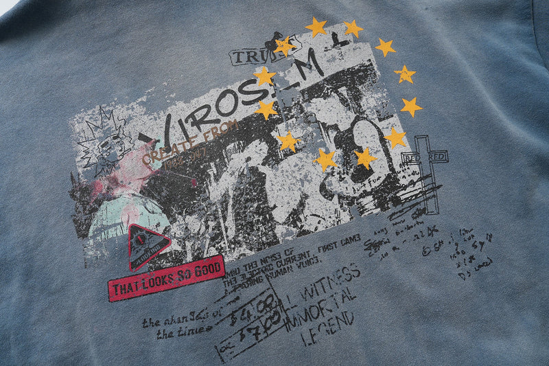 Close-up of back graphic with stars and rock collage on blue hoodie