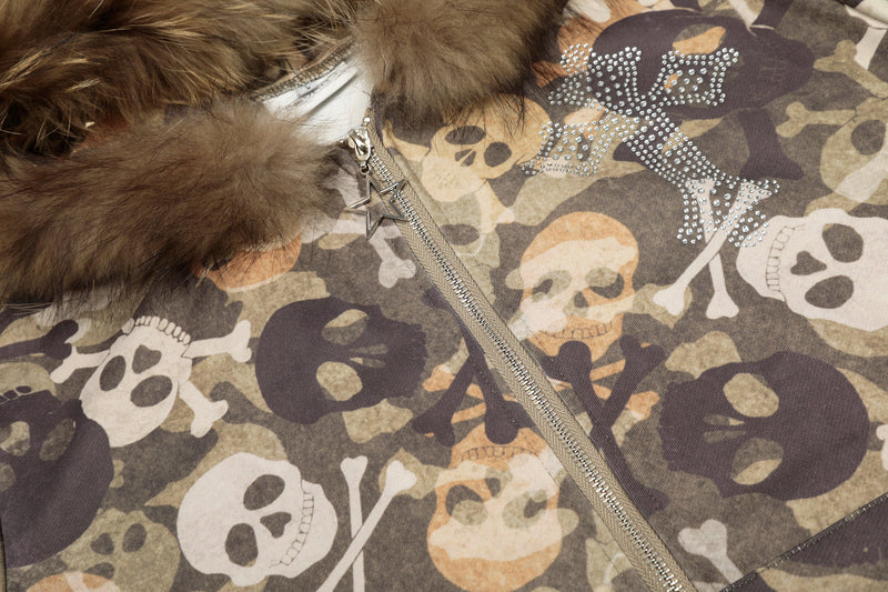 Close-up of front zipper and rhinestone skull graphic on camouflage bomber hoodie jacket